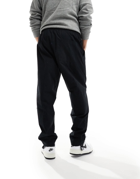 Nike Club woven Barcelona pants in black