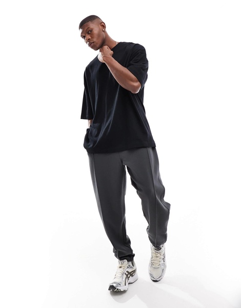 ASOS DESIGN oversized twill jersey sweatpants with pintucks in washed black