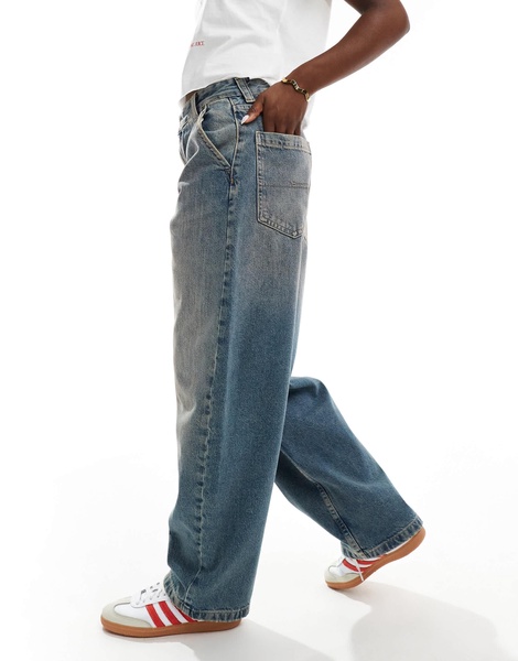 Bershka baggy skater jeans in dirty mid wash blue