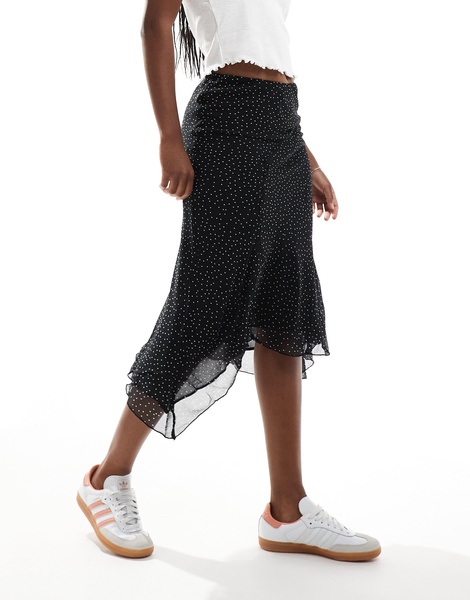 Mango asymmetric hem spot printed midi skirt in black