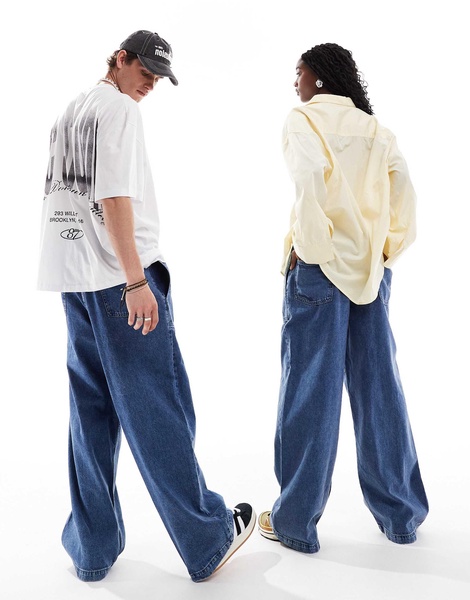 COLLUSION Unisex baggy skate jeans in midwash