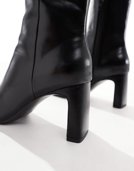 ASOS DESIGN Reach set back mid heel boots in black