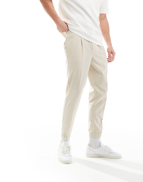 ASOS DESIGN tapered jogger pants in stone