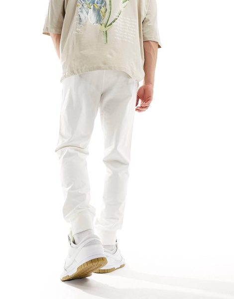 Nike Club logo knit sweatpants in off white