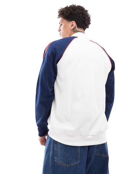 adidas Originals superstar tracktop in white & navy