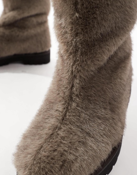 ASOS DESIGN pull on boots in brown faux fur