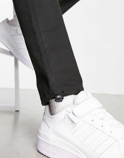 ASOS DESIGN tapered cargo pants with toggles in black