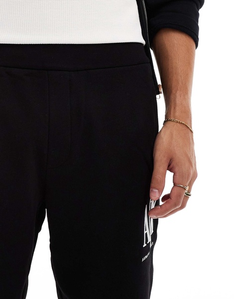 Armani Exchange logo jersey shorts with black