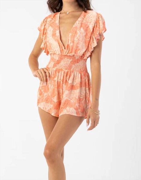 dahlia romper in banana leaves coral