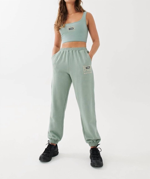 grand stand track pant in iceberg green