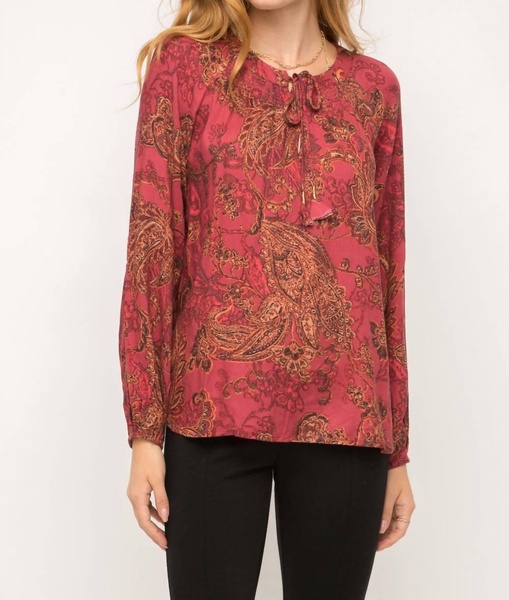 smocked neck tassel tie peasant blouse in burgundy paisley print