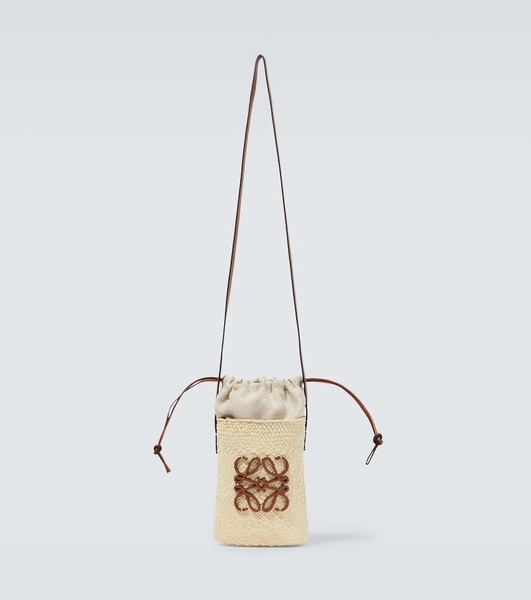 Paula's Ibiza Anagram woven bucket bag