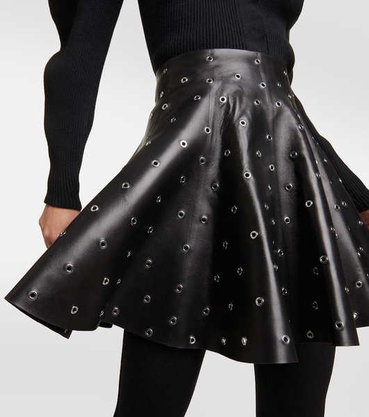 Eyelet embellished leather miniskirt