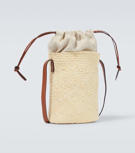 Paula's Ibiza Anagram woven bucket bag