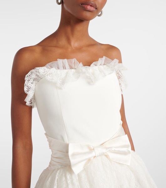 Peplum lace-trimmed cady bustier gown