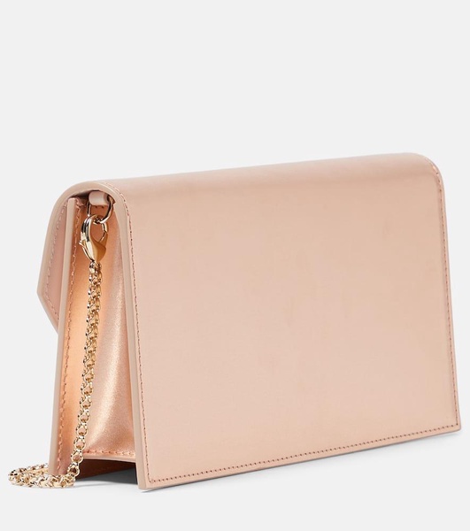 Loubi54 Small leather-trimmed silk clutch