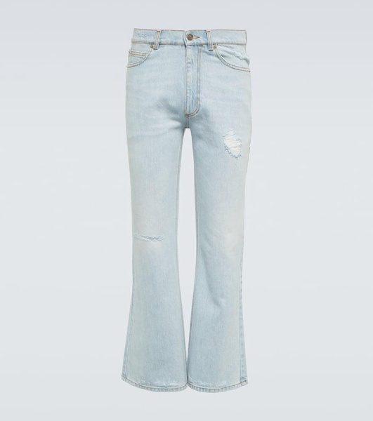 Distressed mid-rise flared jeans