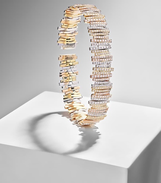 18kt yellow, rose, and white gold bracelet with diamonds