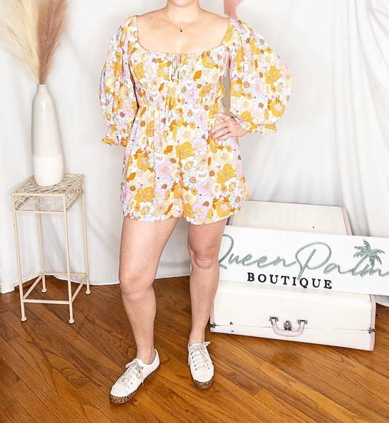 dare to shine floral romper in yellow