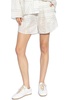 Totême Monogram-Embroidered Mid-Rise Shorts