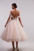 Feminine tulle cocktail dress with the light off-the-shoulder sleeves