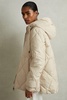 Quilted Puffer Coat in Cream