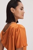 Anna Quan Satin Off-The-Shoulder Top in Kumquat