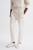 Reiss | Ché Motif Cotton Drawstring Joggers in Off White