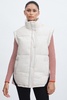 The Upside Contrast-Panel Puffer Gilet in Off White/Multi