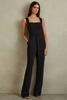 Cross Back Belted Jumpsuit in Black