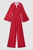 Cut-Out Flared Sleeve Jumpsuit in Coral