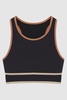 The Upside Racerback Cut-Out Sports Bra in Black