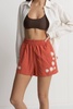 flora embroidered shorts in coral