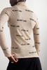 Printed ribbed wool turtleneck top