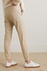 Faux stretch-leather track pants