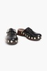 Studded leather clogs