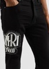 Logo-embroidered skinny jeans 