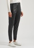 Black faux stretch-leather sweatpants