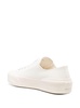 White Lace-Up Low Top Sneakers in Canvas Man