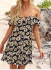 the connie dress in black, yellow, white daisy floral