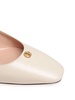 Emblem-plaque slingback leather pumps