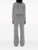 warped houndstooth jacquard wool-blend trousers