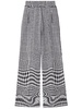 warped houndstooth jacquard wool-blend trousers