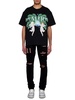 Amiri Logo Patch Distressed Skinny Jeans