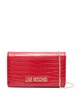 Red crocodile-embossed synthetic leather clutch