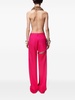 Asymmetric slit trousers