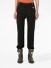 padlock-embellished slim-leg trousers