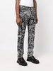 all-over graphic-print jeans