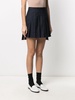 dropped back mini pleated skirt