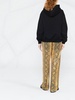 sequin-embellished snakeskin-print trousers